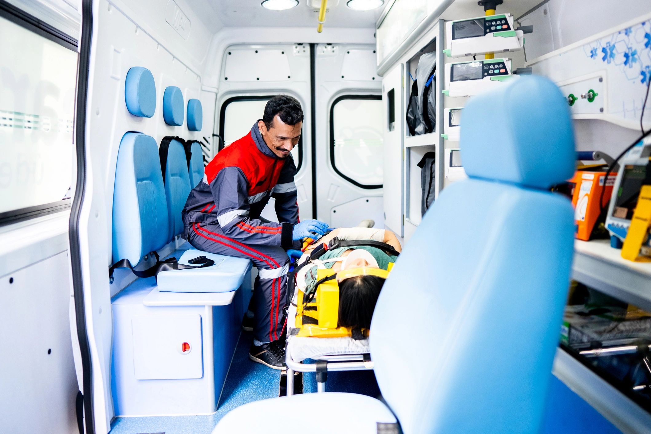 Paramedic attending a accident victim at ambulance