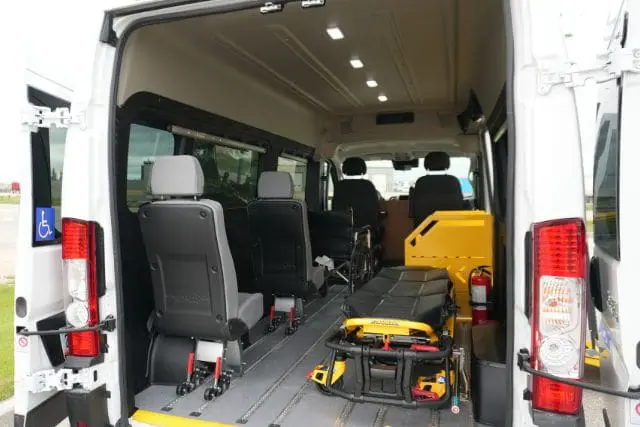 Stretcher being prepared for patient transport